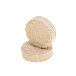 Two Light orange chewable tablets stack on top of each other with one laying flat and the other standing upright.